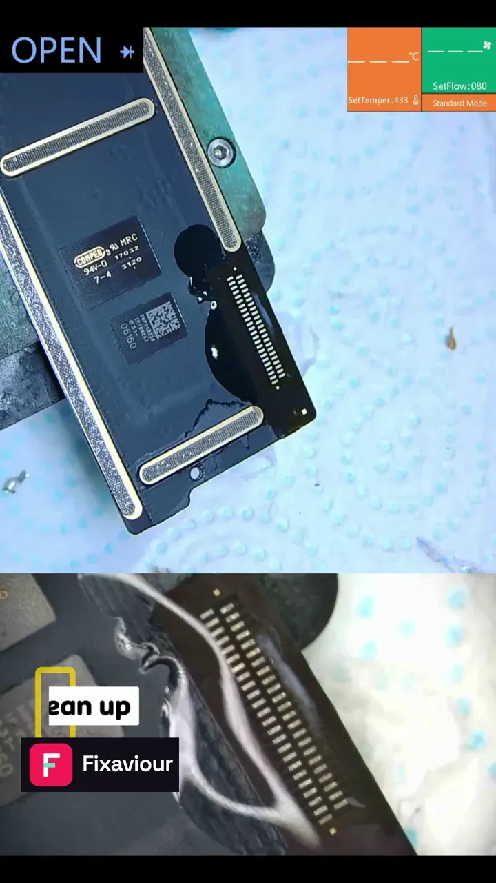 Charging-port flex being fitted to an eighth-generation iPad logic board