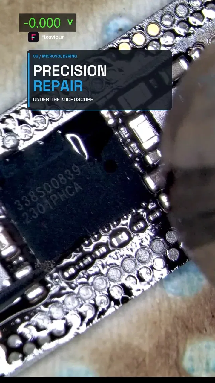 Microscope work during an iPhone 14 Pro Max Tigris U4000 repair