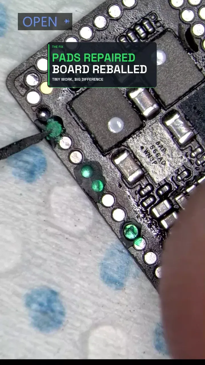 Damaged interposer pad area exposed during an iPhone XS Max no-touch repair